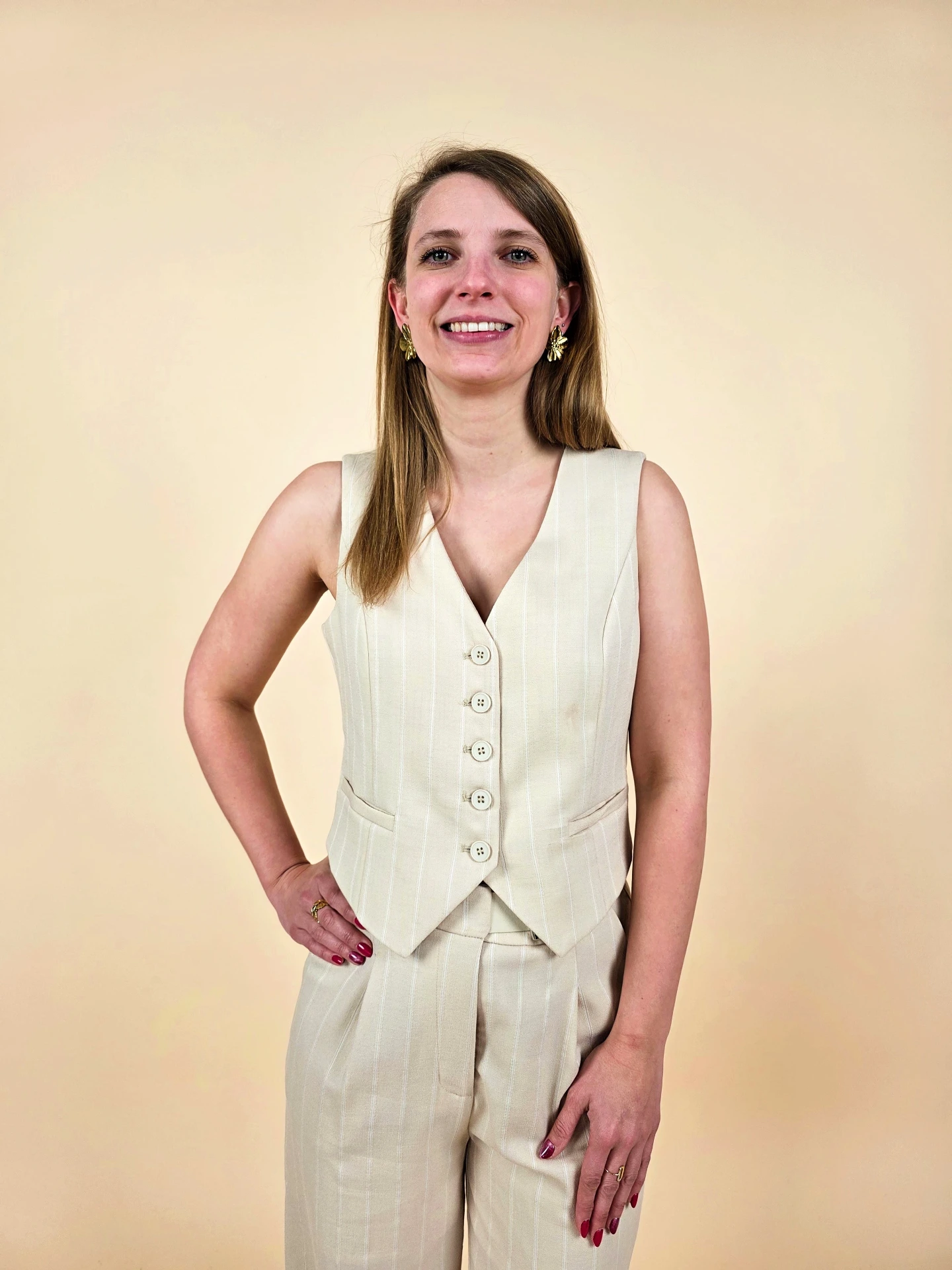 Gilet de tailleur sans manches beige à rayures verticales